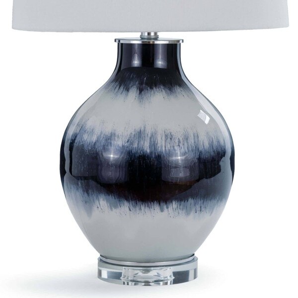 White and indigo body of a glass lamp